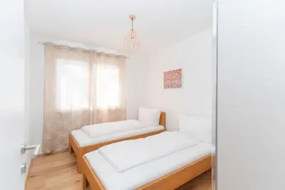 Ein Bett oder Betten in einem Zimmer der Unterkunft Luxurious apartment with big balcony near city center