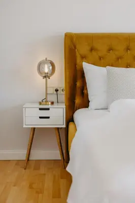 Ein Bett oder Betten in einem Zimmer der Unterkunft Villa SEEhnsucht Ferienwohnungen