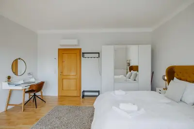 Ein Bett oder Betten in einem Zimmer der Unterkunft Villa SEEhnsucht Ferienwohnungen