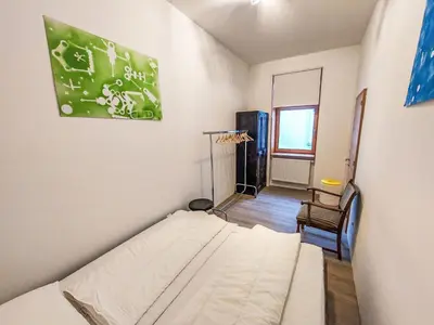 Ein Bett oder Betten in einem Zimmer der Unterkunft Apartment Happy Pasetti by Interhome
