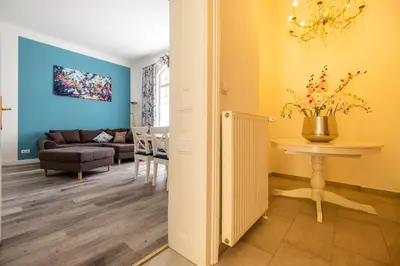 Ein Sitzbereich in der Unterkunft Albizia-Apartments
