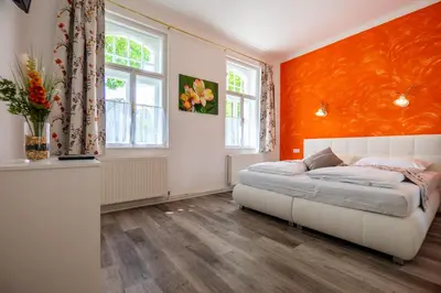 Ein Sitzbereich in der Unterkunft Albizia-Apartments