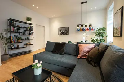 Ein Sitzbereich in der Unterkunft Experience Fresh Comfort in our Brand-New Apartment in Vienna's 17th District