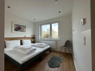 Ein Bett oder Betten in einem Zimmer der Unterkunft Lion`s Rooms n Apartments
