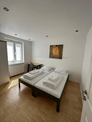 Ein Bett oder Betten in einem Zimmer der Unterkunft Lion`s Rooms n Apartments