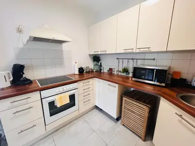 Küche/Küchenzeile in der Unterkunft Gemütliche Wohnung nähe Hauptbahnhof und Zentrum