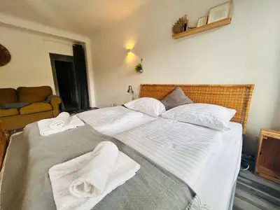 Ein Bett oder Betten in einem Zimmer der Unterkunft Gemütliche Wohnung nähe Hauptbahnhof und Zentrum