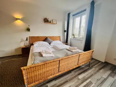Ein Bett oder Betten in einem Zimmer der Unterkunft Gemütliche Wohnung nähe Hauptbahnhof und Zentrum