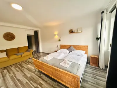 Ein Bett oder Betten in einem Zimmer der Unterkunft Gemütliche Wohnung nähe Hauptbahnhof und Zentrum