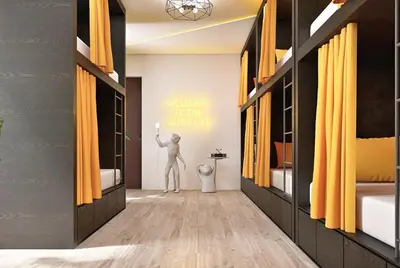 Ein Bett oder Betten in einem Zimmer der Unterkunft Stadtaffe - Chic Hostel VIE
