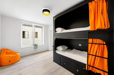 Ein Bett oder Betten in einem Zimmer der Unterkunft Stadtaffe - Chic Hostel VIE