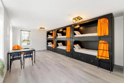 Ein Bett oder Betten in einem Zimmer der Unterkunft Stadtaffe - Chic Hostel VIE