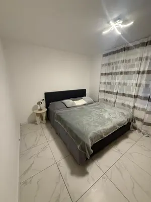 Ein Bett oder Betten in einem Zimmer der Unterkunft Apartment-Alex