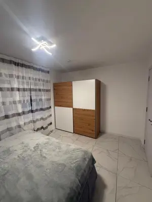 Ein Bett oder Betten in einem Zimmer der Unterkunft Apartment-Alex