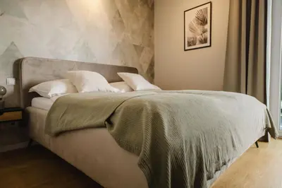 Ein Bett oder Betten in einem Zimmer der Unterkunft URBAN UNIT - nearby city center