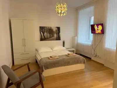 Ein Bett oder Betten in einem Zimmer der Unterkunft AKH - UNI 10min - Zentrum 10 min