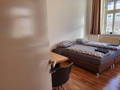 Ein Bett oder Betten in einem Zimmer der Unterkunft Apartment Schweglerstrasse - near Stadthalle