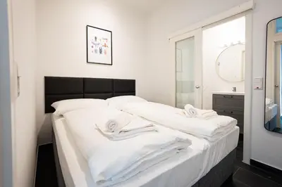 Ein Bett oder Betten in einem Zimmer der Unterkunft Brand-new apartment in the 17th district of Vienna