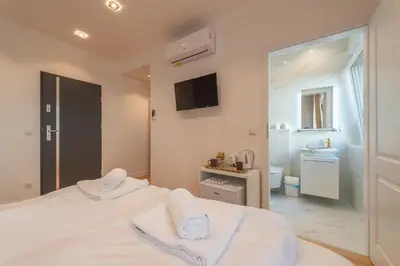 Ein Bett oder Betten in einem Zimmer der Unterkunft Cool Boutique Apartments - Leopoldstadt