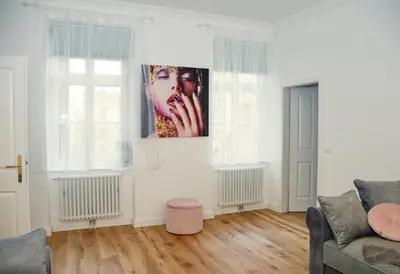 Ein Sitzbereich in der Unterkunft Pink Lotus Apartment