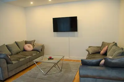 TV/Unterhaltungsangebot in der Unterkunft Pink Lotus Apartment