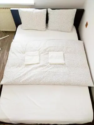 Ein Bett oder Betten in einem Zimmer der Unterkunft Smart Mini Hotel