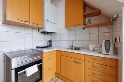 Küche/Küchenzeile in der Unterkunft Cozy Apartment near Center