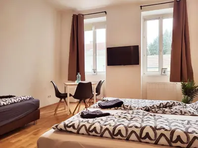 Ein Bett oder Betten in einem Zimmer der Unterkunft Floridsdorfer Apartment - Free Highspeed-Internet