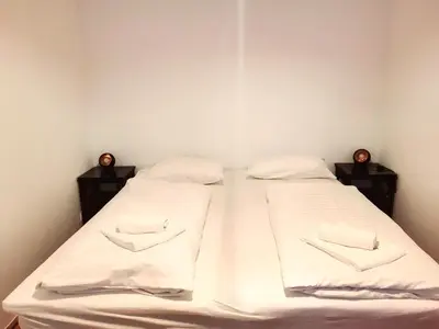 Ein Bett oder Betten in einem Zimmer der Unterkunft Floridsdorfer Apartment - Free Highspeed-Internet