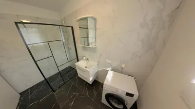 Ein Badezimmer in der Unterkunft TEREC HAUS