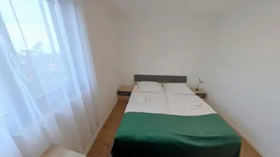 Ein Bett oder Betten in einem Zimmer der Unterkunft TEREC HAUS