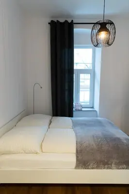 Ein Bett oder Betten in einem Zimmer der Unterkunft STILVOLLES APARTMENT