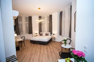 Ein Bett oder Betten in einem Zimmer der Unterkunft Pension Central I Self Check In