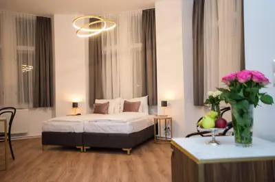 Ein Bett oder Betten in einem Zimmer der Unterkunft Pension Central I Self Check In