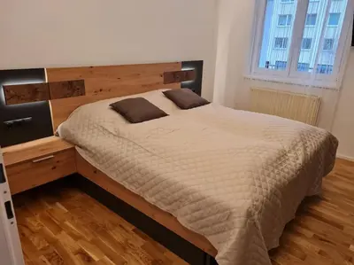 Ein Bett oder Betten in einem Zimmer der Unterkunft Stressless City Apartment Vienna