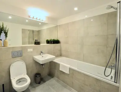 Ein Badezimmer in der Unterkunft Cozy Design Apartment