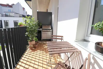 Ein Balkon oder eine Terrasse in der Unterkunft Smart Apt mit Balkon am Augarten park Nähe Zentrum
