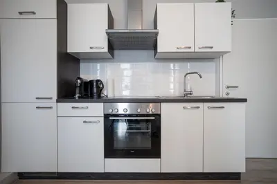 Küche/Küchenzeile in der Unterkunft Beautiful New Apartment near City Center