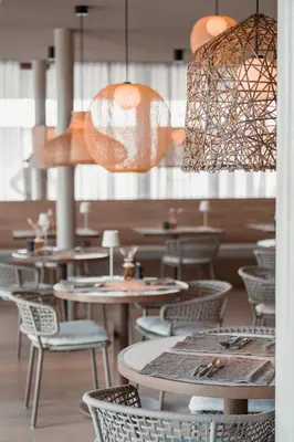 Ein Restaurant oder anderes Speiselokal in der Unterkunft Nils am See - ADULTS ONLY ab 18 Jahren