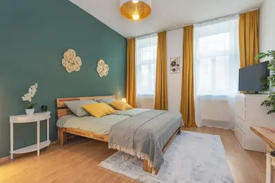 Ein Bett oder Betten in einem Zimmer der Unterkunft Beautiful Apartment - 12 minutes to City Center