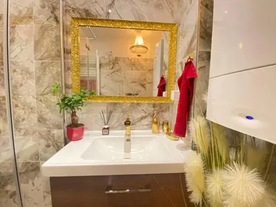 Ein Badezimmer in der Unterkunft Royal Apartment