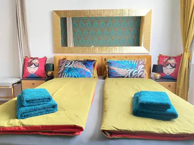 Ein Bett oder Betten in einem Zimmer der Unterkunft Royal Apartment