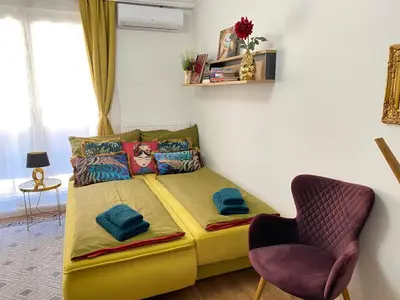 Ein Bett oder Betten in einem Zimmer der Unterkunft Royal Apartment