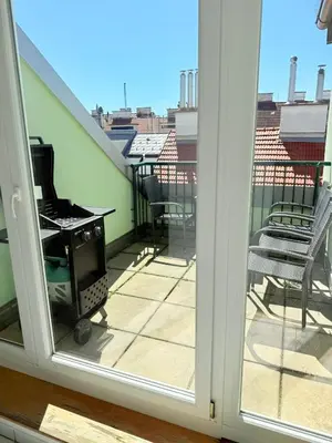 Ein Balkon oder eine Terrasse in der Unterkunft Dachterrasse für 4 Personen