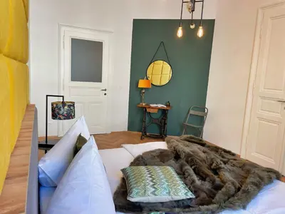 Ein Bett oder Betten in einem Zimmer der Unterkunft Loft2Be, Vienna City Loft for 8