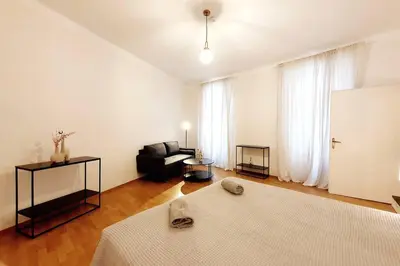 Ein Bett oder Betten in einem Zimmer der Unterkunft Savoir Vivre Apartments Rueppgasse