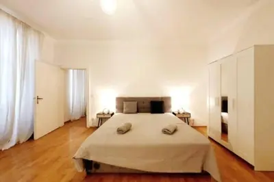 Ein Bett oder Betten in einem Zimmer der Unterkunft Savoir Vivre Apartments Rueppgasse
