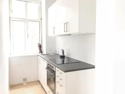 Küche/Küchenzeile in der Unterkunft Classic, Modern&Charming! 7min to Vienna’s center!