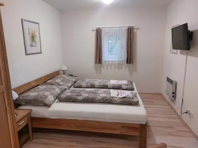 Ein Bett oder Betten in einem Zimmer der Unterkunft Ferienwohnung Kutrowatz