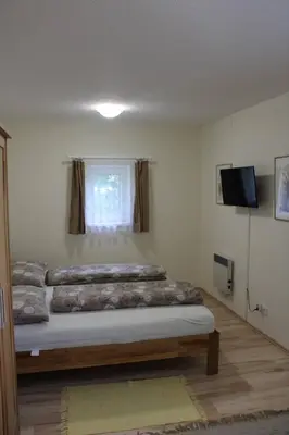 Ein Bett oder Betten in einem Zimmer der Unterkunft Ferienwohnung Kutrowatz
